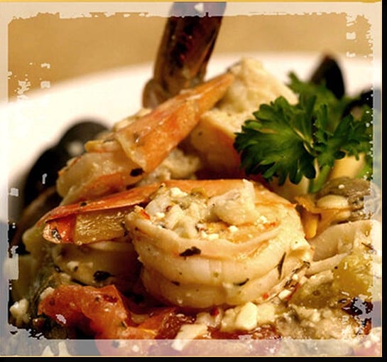 Shrimp, mussels and feta with tomato and parsley, one of Soriah's own plates